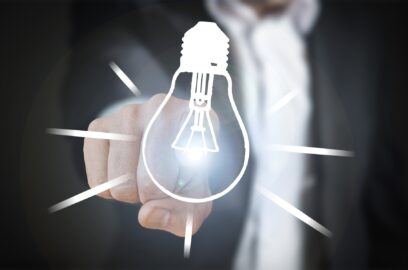 a banner image with a lightbulb and business man