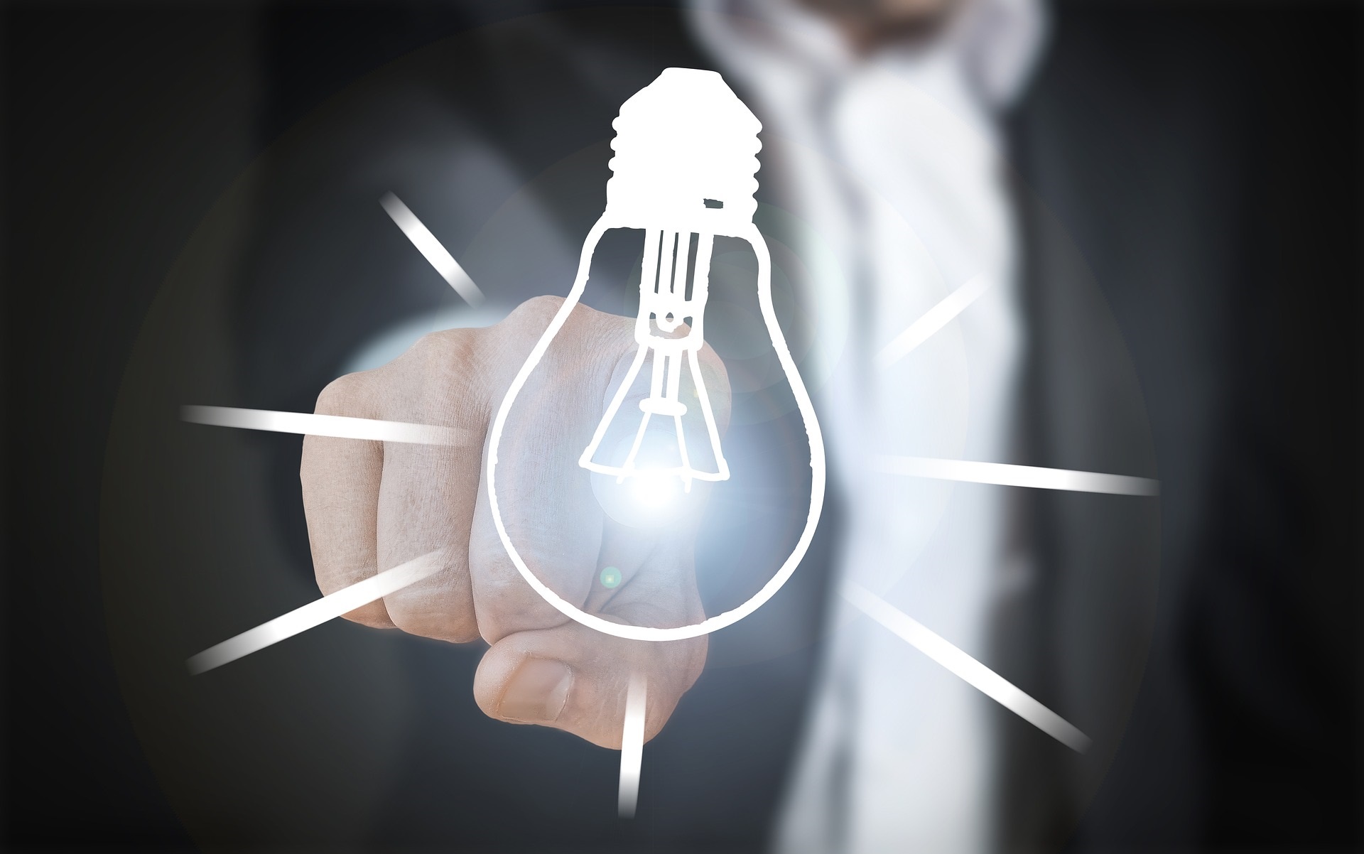 a banner image with a lightbulb and business man