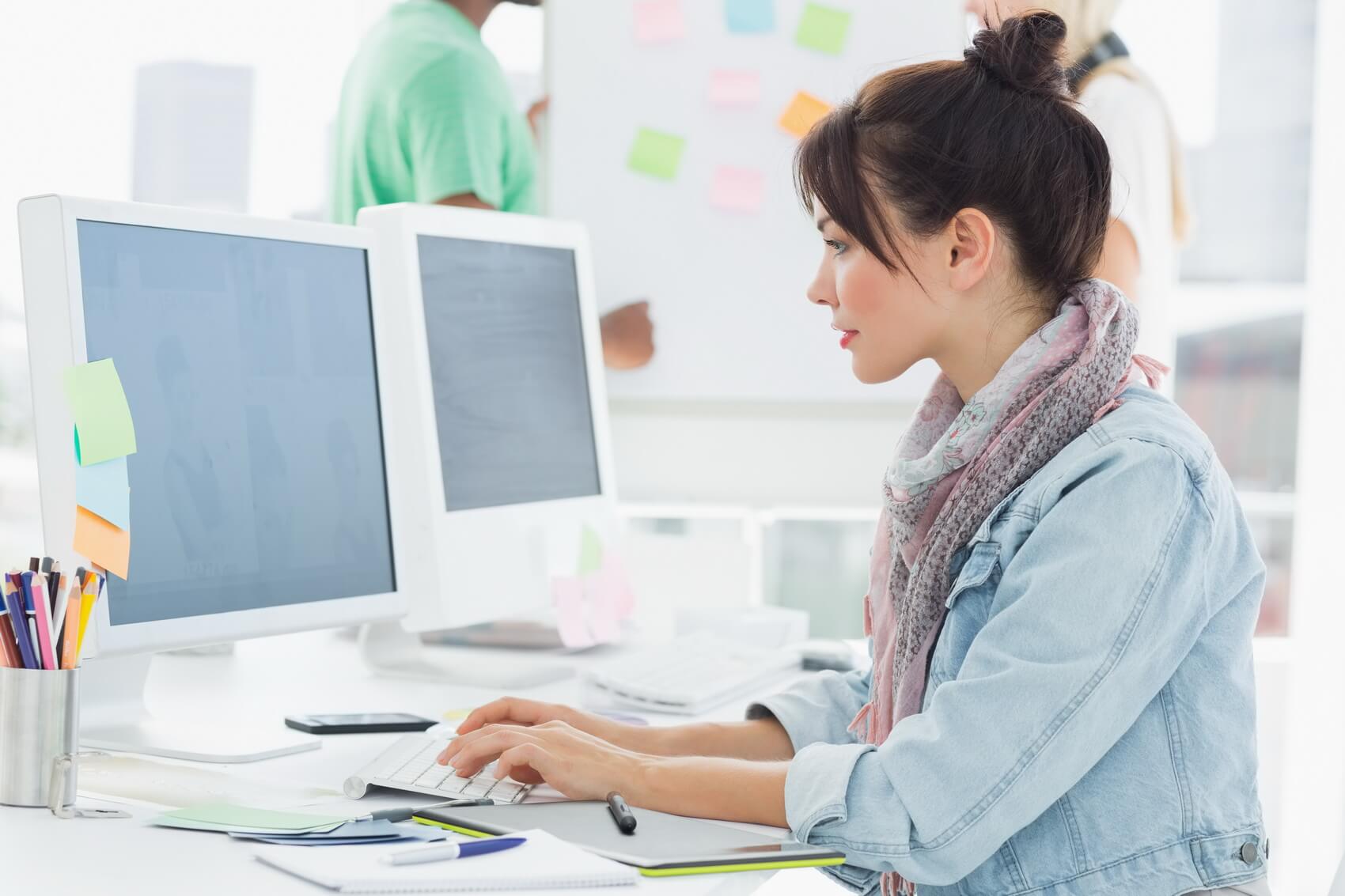 a woman working at a computer