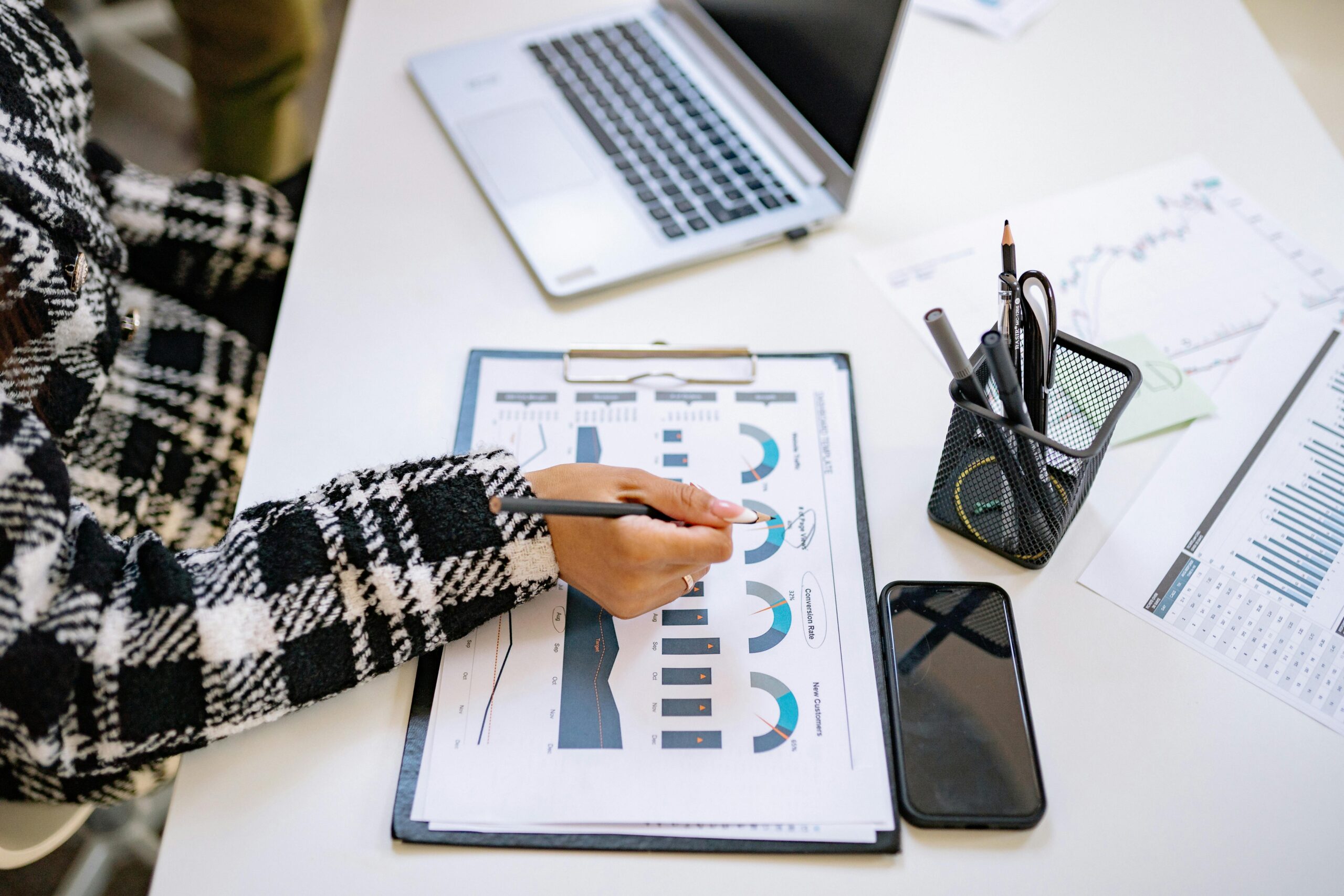 business woman looking at financial reports