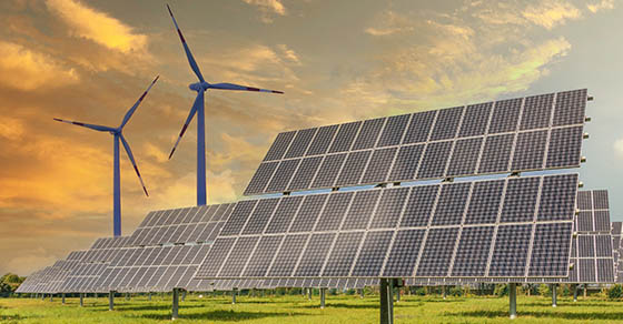 Solar panels wind turbines installed as renewable energy sources for electricity and power supply. Innovation and technology, environmental friendly energy.