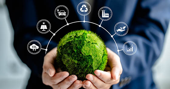 Businesswomen holding green ball globe with ESG icon concepts for Environment, Social, Governance, net zero, carbon neutrality goals, development business sustainable environment concept.