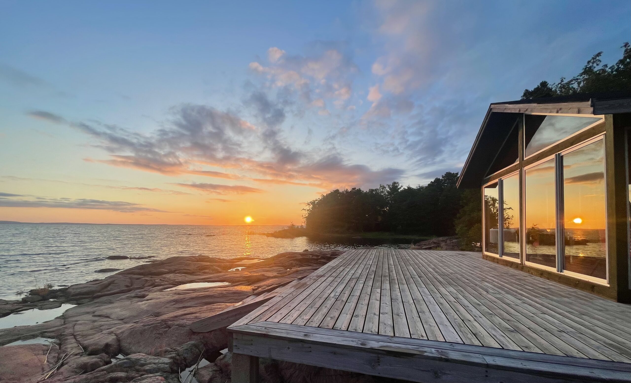 Beach house terrace at summer sunset
