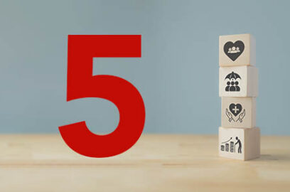 Blocks with healthcare symbols stacked next to the number 5