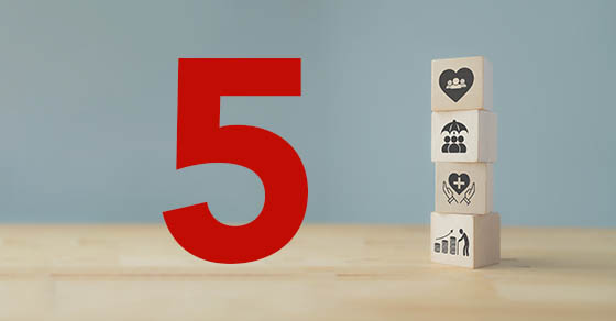 Blocks with healthcare symbols stacked next to the number 5