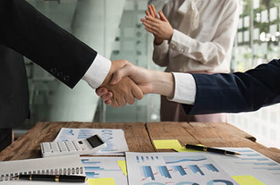 Business Handshake in Office