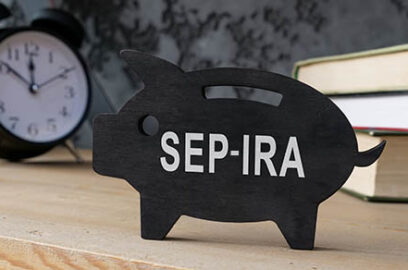 Wooden,Piggy,Bank,With,Sep,Ira,Inscription,On,The,Side.