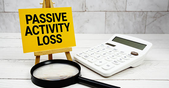 Passive,Activity,Loss,Text,With,Calculator,And,Magnifying,Glass