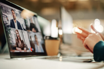 Close-up of laptop screen featuring group video call