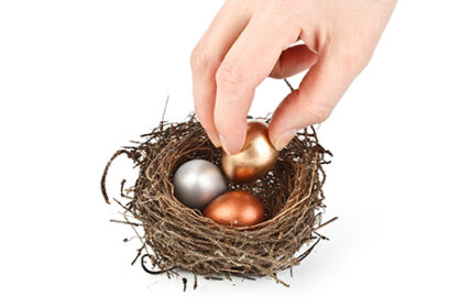Nest egg, hand, placing, golden, egg, in, nest.