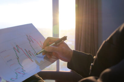 Closeup of someone reviewing financial charts