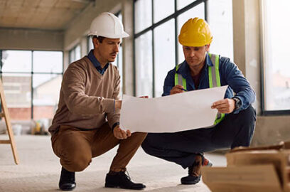 Project,Manager,And,Worker,Cooperating,While,Going,Through,Rebuilding,Plans