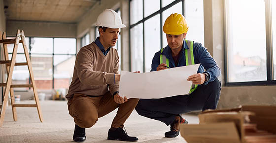 Project,Manager,And,Worker,Cooperating,While,Going,Through,Rebuilding,Plans