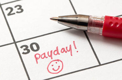Payday,Reminder,Written,On,Calendar,With,Smiley,Face,In,Red