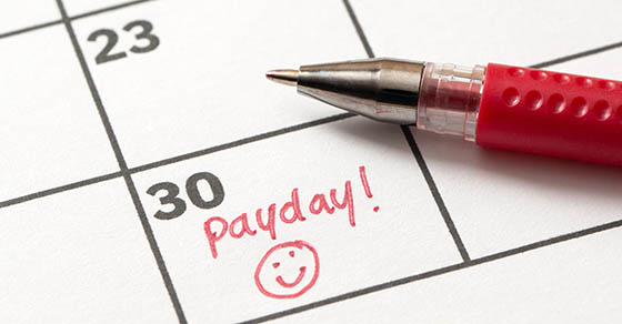 Payday,Reminder,Written,On,Calendar,With,Smiley,Face,In,Red