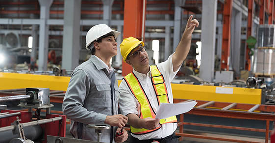 Supervisor,And,Male,Engineer,Working,Together,In,Factory.,Conveyor,Belt, production line, during manufacturing