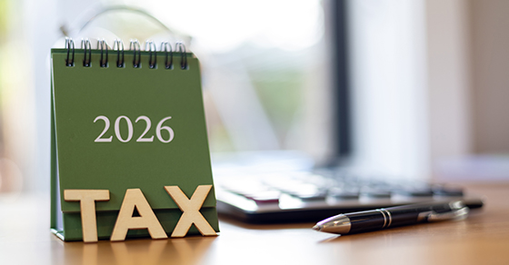 Calendar, 2026, Wooden, Letters, TAX, on desk with, calculator