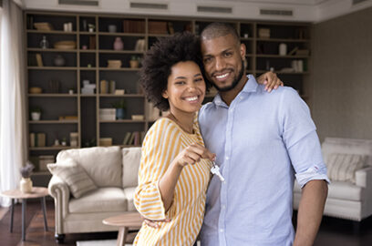 Couple, home, holding keys, mortgage