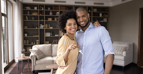 Couple, home, holding keys, mortgage